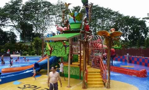 Kids have fun at the Wet Play area at Jurong Bird Park in Singapore.